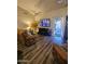 Spacious living room featuring luxury vinyl plank flooring and backyard access at 23833 N 39Th N Ln, Glendale, AZ 85310