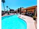 Beautiful backyard featuring a sparkling blue pool and a covered patio perfect for outdoor entertaining at 23833 N 39Th N Ln, Glendale, AZ 85310
