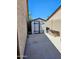 Enclosed backyard shed with painted wood doors and secure latch at 23833 N 39Th N Ln, Glendale, AZ 85310