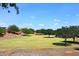 Lush greenbelt in a well-maintained community, offering open space and serene views at 2413 S 121St Dr, Avondale, AZ 85323
