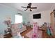 A living room with hardwood flooring, light blue walls, and well-placed decor at 2413 S 121St Dr, Avondale, AZ 85323