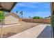 A spacious backyard with a shed and a blank slate for landscaping at 2524 E Elmwood St, Mesa, AZ 85213