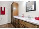 Bathroom featuring tile flooring, wood cabinets and granite countertops at 2524 E Elmwood St, Mesa, AZ 85213