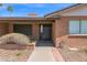 Charming front entrance with brick accents and desert-style landscaping at 2524 E Elmwood St, Mesa, AZ 85213