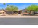 Lovely single-story brick home featuring desert landscaping and a two-car garage at 2524 E Elmwood St, Mesa, AZ 85213