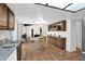 Spacious kitchen with tile floors conveniently opens to dining area at 2524 E Elmwood St, Mesa, AZ 85213