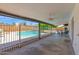 Enjoy outdoor living in this covered patio, featuring a fenced pool for privacy at 2524 E Elmwood St, Mesa, AZ 85213