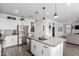 Modern kitchen with stainless steel appliances, a large island, and granite countertops at 26116 N Thornhill Dr, Peoria, AZ 85383