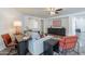 Bright living area features stylish decor, wood floors, and modern furnishings, offering a comfortable and inviting space at 2745 W Sunshine Butte Dr, San Tan Valley, AZ 85144