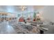 Open living space with a modern kitchen, dining area, and cozy living room is great for families at 2745 W Sunshine Butte Dr, San Tan Valley, AZ 85144