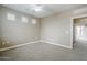 Bedroom featuring neutral walls and carpet, and bright windows to let in light at 2821 S Skyline Dr # 149, Mesa, AZ 85212