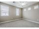 Bedroom featuring neutral walls and carpet, with bright windows to let in light at 2821 S Skyline Dr # 149, Mesa, AZ 85212