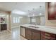 Open kitchen and dining area with stainless steel appliances and modern finishes at 2821 S Skyline Dr # 149, Mesa, AZ 85212