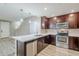 Kitchen with stainless steel appliances, ample cabinetry, and a quartz countertop at 2821 S Skyline Dr # 149, Mesa, AZ 85212