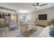 Inviting living room featuring contemporary furnishings and an open floor plan to kitchen and dining area at 2821 S Skyline Dr # 149, Mesa, AZ 85212