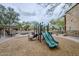 Community playground with slide and climbing structure, perfect for outdoor fun and recreation for families at 2821 S Skyline Dr # 149, Mesa, AZ 85212