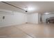 Spacious garage with ample room for parking and storage, featuring a clean and bright interior at 29870 W Weldon Ave, Buckeye, AZ 85396