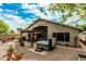 Spacious backyard showcasing a relaxing hot tub and covered patio with pergola at 29915 N Maravilla Dr, San Tan Valley, AZ 85143