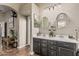 Bathroom featuring double sinks, decor, and tile flooring at 29915 N Maravilla Dr, San Tan Valley, AZ 85143