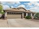 Charming single-story home featuring a desert landscaped yard and a convenient two-car garage at 29915 N Maravilla Dr, San Tan Valley, AZ 85143