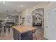 Spacious kitchen with kitchen island and easy access to the living room and dining areas at 29915 N Maravilla Dr, San Tan Valley, AZ 85143