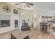 Spacious interior showcasing hardwood floors and an open layout connecting living areas at 29915 N Maravilla Dr, San Tan Valley, AZ 85143