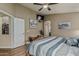 Relaxing main bedroom with a comfortable bed, wood floors, and tranquil decor at 29915 N Maravilla Dr, San Tan Valley, AZ 85143