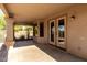 Covered back patio offering a relaxing outdoor space with a view of the fenced yard and surrounding greenery at 3002 S Marigold Pl, Chandler, AZ 85248