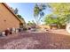 Spacious backyard featuring a pool, desert landscaping and ample room, perfect for creating your outdoor oasis at 3002 S Marigold Pl, Chandler, AZ 85248