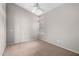 Bright bedroom with neutral carpet, vaulted ceilings, and a window, offering a comfortable and inviting space at 3002 S Marigold Pl, Chandler, AZ 85248