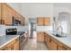 Well-equipped kitchen with stainless appliances, subway tile backsplash, and ample counter space at 3002 S Marigold Pl, Chandler, AZ 85248