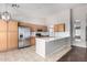 Open kitchen with stainless steel appliances, a large island, and lots of cabinet space at 3002 S Marigold Pl, Chandler, AZ 85248