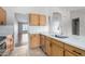 Kitchen with stainless dishwasher, kitchen cabinets and solid surface countertop at 3002 S Marigold Pl, Chandler, AZ 85248