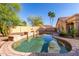 Refreshing private backyard pool with stone accents, perfect for relaxing swims and outdoor enjoyment in a serene setting at 3002 S Marigold Pl, Chandler, AZ 85248