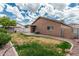 This backyard features a lawn, a patio, and a fence at 3212 W Lucia Dr, Phoenix, AZ 85083