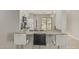 The kitchen features granite countertops, stainless steel appliances, and bar stool seating at 3212 W Lucia Dr, Phoenix, AZ 85083