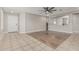 An open-concept living room with wood flooring, neutral walls, and plenty of natural light at 3212 W Lucia Dr, Phoenix, AZ 85083