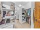 Spacious walk-in closet with custom shelves and ample storage for clothes, shoes, and accessories at 3217 N Piedra Cir, Mesa, AZ 85207