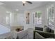 Bright living room featuring a neutral color palette, large windows, and comfortable seating at 3233 E Sequoia Dr, Phoenix, AZ 85050