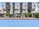 Modern community pool with lounge chairs, great for relaxation and socializing in style at 325 E Coronado Rd # 8, Phoenix, AZ 85004