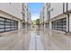 Modern townhome exterior featuring glass garage doors and neutral color palette at 325 E Coronado Rd # 8, Phoenix, AZ 85004