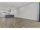 Open-concept living area with tile floors, connecting to the kitchen and dining spaces at 325 E Coronado Rd # 8, Phoenix, AZ 85004