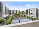 Community pool offers a refreshing retreat surrounded by modern townhomes and landscaping at 325 E Coronado Rd # 8, Phoenix, AZ 85004
