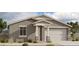 Charming single-story home with neutral stucco, inviting entrance, and a convenient two-car garage at 32615 N Newby Dr, San Tan Valley, AZ 85143