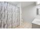Bathroom with a shower and tub combination, vanity, and toilet at 338 W Taro Ln, Phoenix, AZ 85027