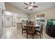 Eat-in kitchen area featuring tiled floors, modern appliances, and natural light at 338 W Taro Ln, Phoenix, AZ 85027