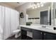 Bathroom with dark wood floors, vanity and shower/tub combination at 3730 S Chaparral Rd, Apache Junction, AZ 85119