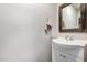 Bathroom vanity with a mirror and a simple sink, complemented by neutral wall color at 3730 S Chaparral Rd, Apache Junction, AZ 85119