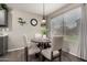 Cozy breakfast nook with a round table, chairs and window with natural light at 3730 S Chaparral Rd, Apache Junction, AZ 85119