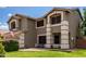 Charming two-story home with well-maintained landscaping and a welcoming front entrance at 3730 S Chaparral Rd, Apache Junction, AZ 85119